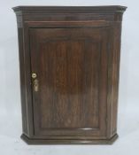 19th century oak single door hanging corner cupboard with fluted pilasters, 96cm high