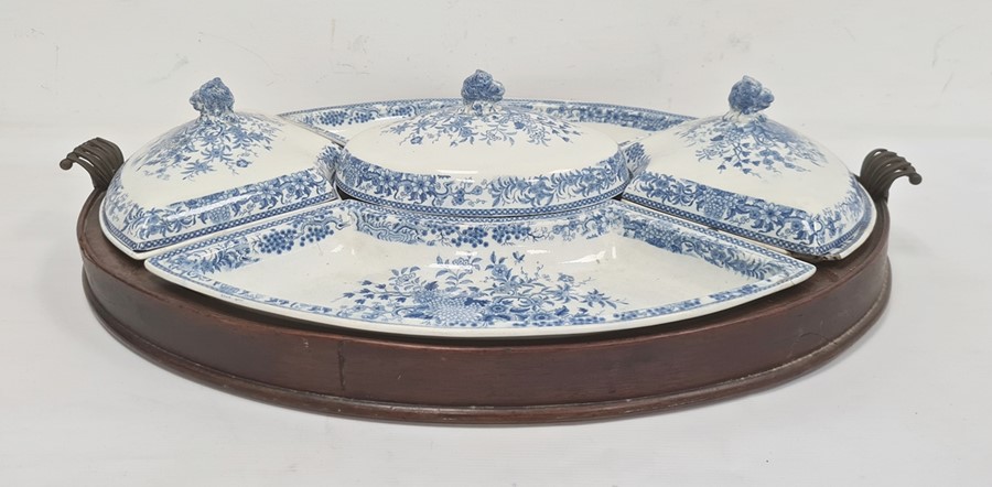 19th century blue and white pottery set of serving dishes, in fitted mahogany oval tray with foliate