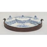 19th century blue and white pottery set of serving dishes, in fitted mahogany oval tray with foliate