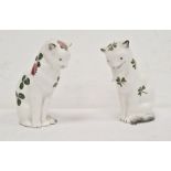 Two Plichta pottery model cats, one decorated with clover flowers and leaves 15cm high, the other