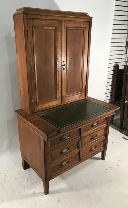 20th century oak desk / dressing cabinet, leather writing surface revealing inkwells, the upper