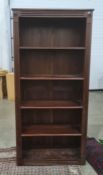 Pair of modern mahogany open bookcases with fluted pilasters, on plinth bases (2)  Condition