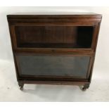 20th century Globe Wernicke-style bookcase with two glass doors, raised on castors, 85cm x 90cm