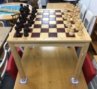 Beech chess table on square supports (with chess pieces)