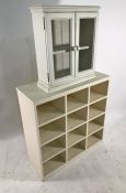 White painted pigeonhole-type bookcase and a wall-hanging food cupboard (2)  Condition ReportThe