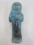 Egyptian New Kingdom glazed faience Ushabti of typical mummified form with line of vertical text,