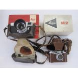 Leica M2-995 442 rangefinder camera, a Summaron lens serial number 1810648, an IROOA lens hood, in