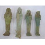 Four Egyptian blue glazed faience Ushabti in typical mummified form, one with swing label