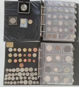 Two folders of world coins with miscellaneous others