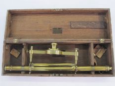 Brass theodolite by G Adams London in wooden fitted case, 53.5cm long Condition ReportCompass