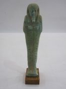 Egyptian blue glazed faience Ushabti in typical mummified form, with three lines of hieroglyphical