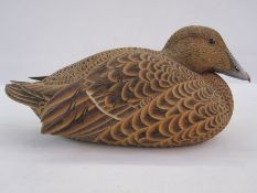 Philip Nelson decoy duck of female eider duck, marked April 93 to base  17 cms h. x 38 cms