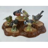 12 various Beswick small model birds to include kingfisher and a Beswick ceramic bark-pattern five-