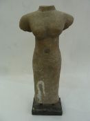 South East Asian carved stone figure on a rectangular base  Condition ReportApprox: Height 47cm x