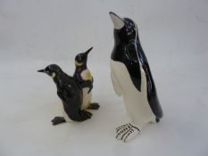 Beswick model penguin group,1015 and another ceramic model penguin  Part of the Wildfowl and