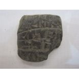 Small cuneiform pottery accounts tablet, circa 200BC, with accompanying written inscription 'Small