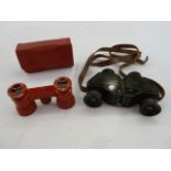 Pair of Tourix 6x binoculars and a pair of Busch Multinett binoculars, in red leather case (2)