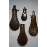 Embossed copper shot flask, and embossed brass shot flask, and two further shot flasks (4)