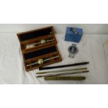 Marine hydrometer marked Dobbie McInnes Ltd, Glasgow Greenock, in case, a further marine hydrometer,