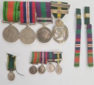 Medal group of four awarded to 'MAJOR C.S.N. WALKER.R.A', WWII defence and war medal unnamed as