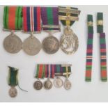 Medal group of four awarded to 'MAJOR C.S.N. WALKER.R.A', WWII defence and war medal unnamed as