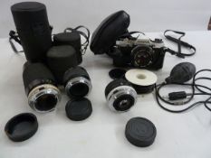 Olympus10 camera, cased, a Hoyer HMC Zoom 80-200mm 1:4 lens no.331954, a Hoyer Auto Teleconverter 3x