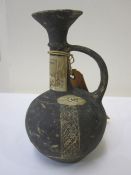 Early Bronze Age Cypriot terracotta ewer with incised geometric decoration with everted rim,