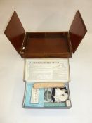 'The Householders' First Aid Case for A.R.P', boxed and a wooden lidded box the lid marked 'R.H.