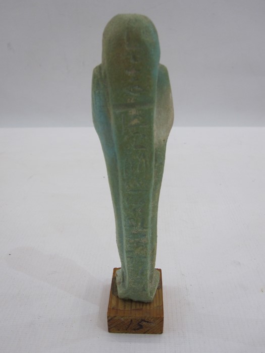 Egyptian blue glazed faience Ushabti in typical mummified form, with three lines of hieroglyphical - Image 2 of 4