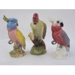 Three Beswick models viz:- no.1218 woodpecker, no.1180 cockatoo in shades of pink and white and no.