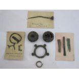 Collection of Roman and Iron Age bronze objects to include terret ring, Roman bronze pin,