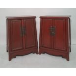 Pair of modern red lacquer Chinese-style bedside cabinets, the rectangular tops with rounded corners