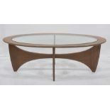 Victor Wilkins for G-Plan 'Astro' coffee table of oval form, glass top, teak body, 128cm x 42cm