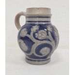 17th century Westerwald stoneware jug circa 1690-1700, with underglaze blue and incised tulip and