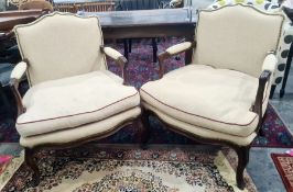 Two modern French-style arm chairs in French linen, with carved mahogany frames (2)