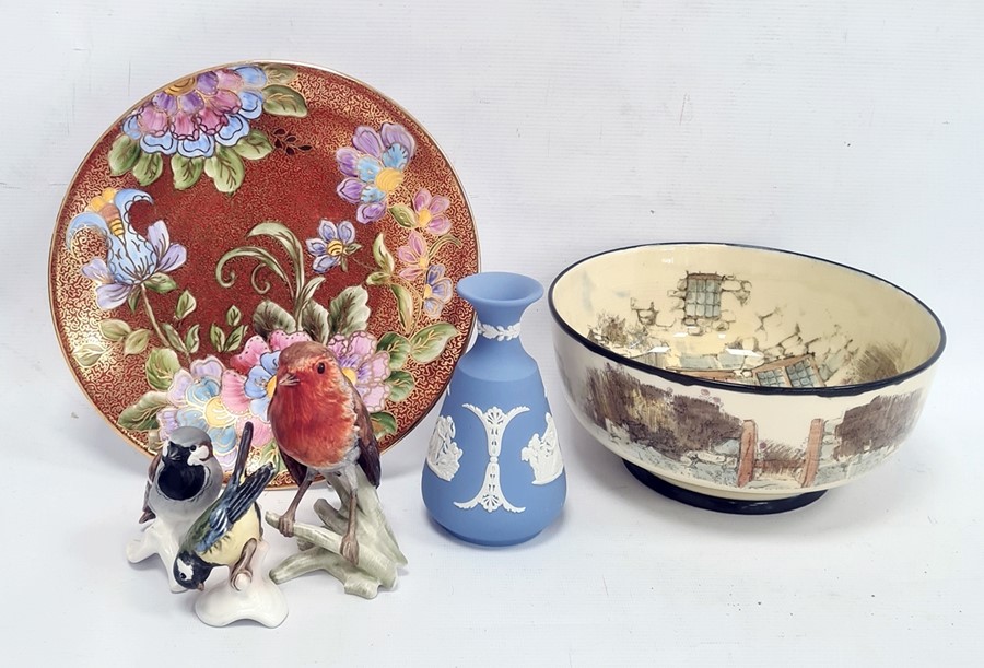 A Goebel model of a robin, a bluetit and other birds, a Wedgwood blue lustreware miniature vase, a