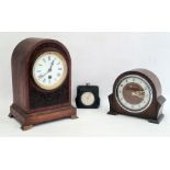 20th century oak arch topped mantel clock with roman numerals to the enamel dial, further 20th