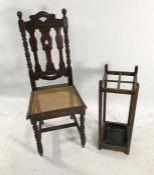 Cane seated oak-framed chair and a stickstand (2)