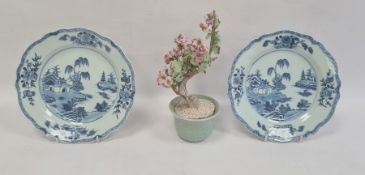 Pair Chinese porcelain plates, wavy bordered with underglaze blue lakeside landscape decoration,