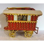 Colourful painted wood model gypsy caravan, 41cm wide