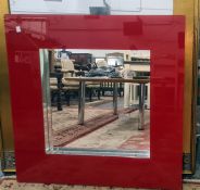Modern square mirror in red perspex frame, 80cm square
