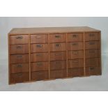 20th century oak filing chest of 25 assorted drawers, 121cm x 61cm