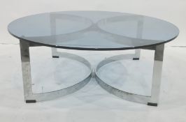 Circular glass-topped coffee table on chromed curvy X base, 89cm diameter