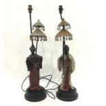 Pair Asian style painted bronze finish Chinese figure table lamps, each figure in flowing robes,