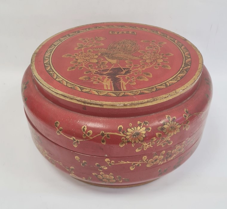 Chinese lacquered wood dowry box and cover, circular, red ground with peacock and flowering branch