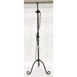 Wrought iron standard lamp on three legs