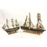 Painted wood model of HMS Victory, 50cm wide and model of three-masted sailing ship, 75cm wide (2)