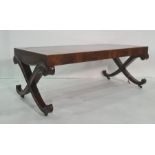 20th century mahogany and leather-topped rectangular coffee table, on curvy X-end supports to