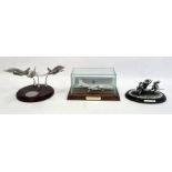 Pewter model of Harrier 1982, scale model 'reds on high' and scale pewter sculpture 'storming the