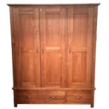 Pair of modern oak three-door wardrobes on bases with two drawers (2)  Condition ReportYes the